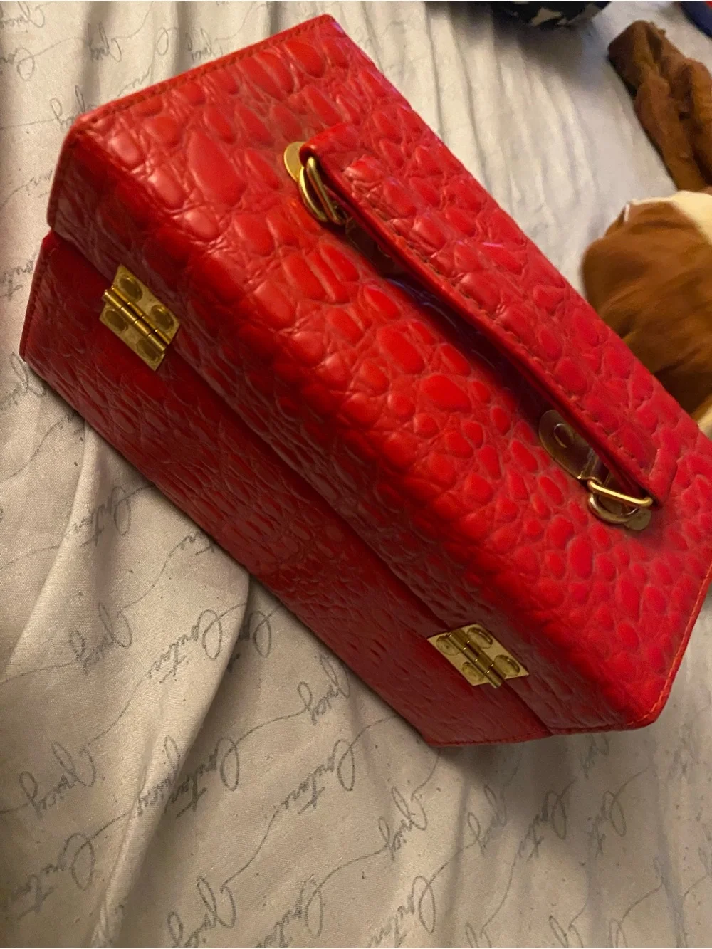 Red Textured Cosmetic Jewelry Case with Gold-Tone Clasp